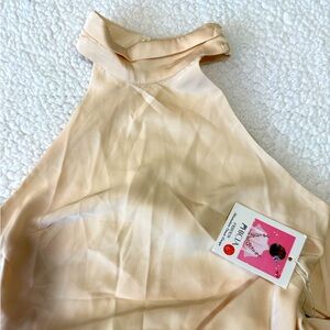 Elegant Cream Sleeveless Blouse